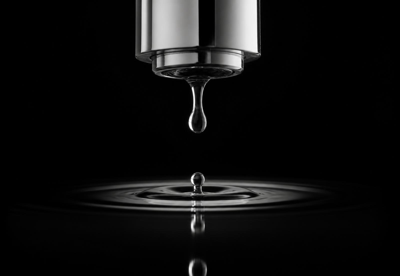 Water falling from a polished chrome spout